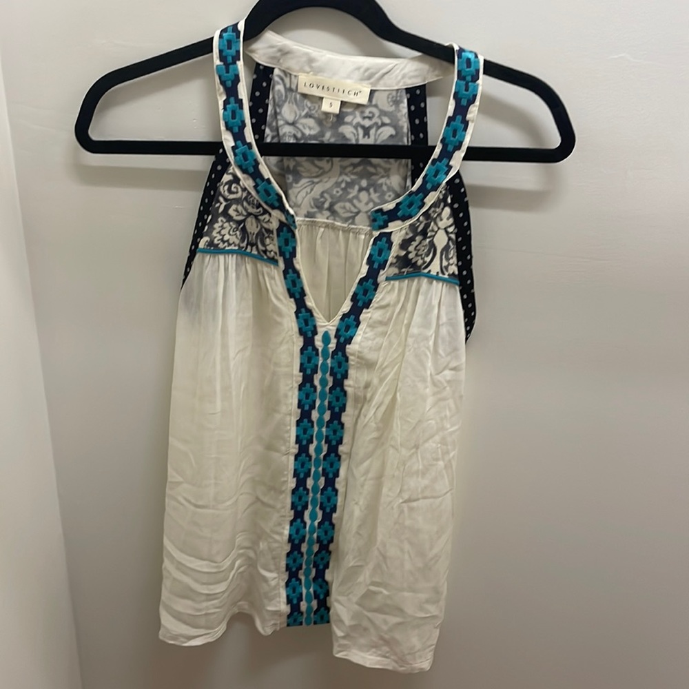 White Lovestitch v-neck tank with embroidered details